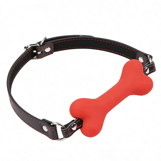Bâillon de dressage petplay Alpha Bone avec embout os en silicone rouge et sangle de maintien en cuir PU pour jeu de rôle puppy et silence imposé.