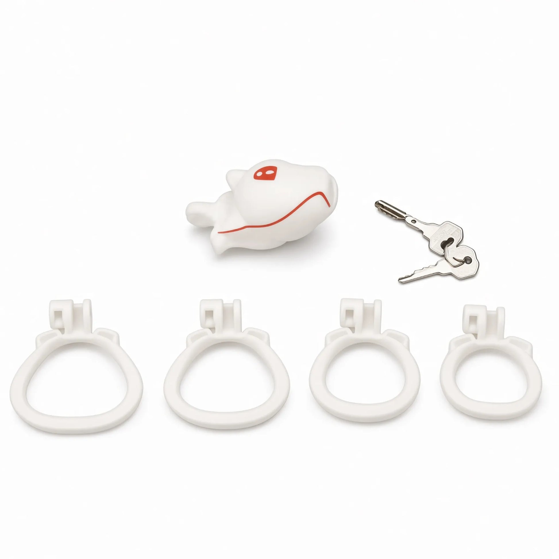 Cage de chasteté chiot blanche Alpha Pup fournie avec 4 anneaux ergonomiques blancs et ses clés.